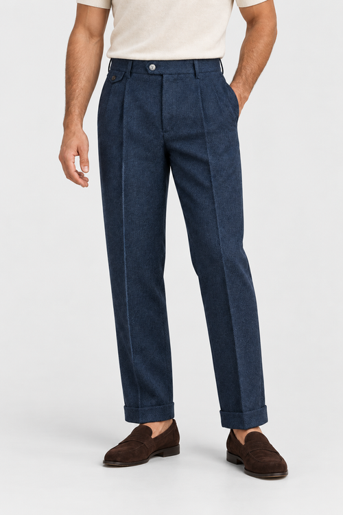 Navy pleated trousers, studio front view