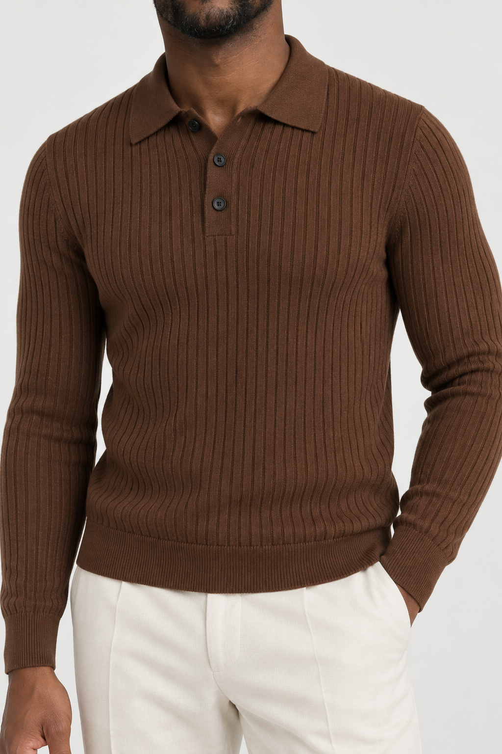 Chocolate ribbed polo on Malik, studio knit and collar detail