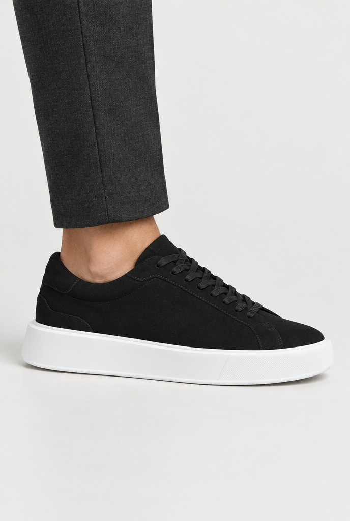 The Low-Profile Trainer — Black — shoe upper and sole detail