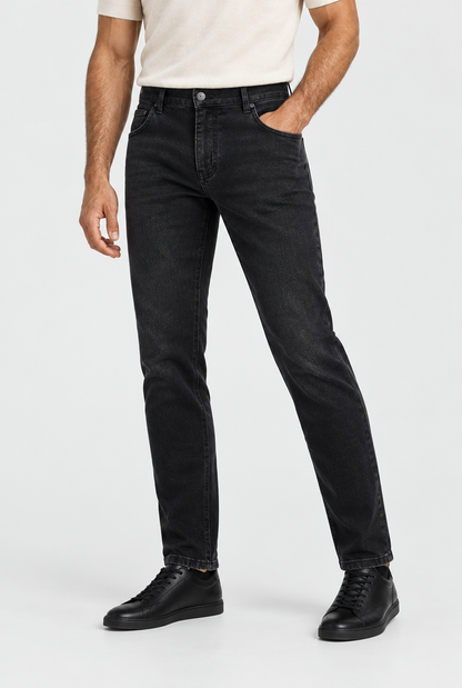 The Slim Jean — Midnight Black — primary studio view